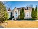 Stately brick home featuring manicured landscaping and a circular driveway for added curb appeal at 1214 Greenridge Ln, Lithonia, GA 30058