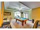Entertaining game room complete with a billiards table, comfortable seating, and recessed lighting for a fun space at 1214 Greenridge Ln, Lithonia, GA 30058