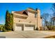 Spacious two-car garage with classic white doors providing ample parking and storage at 1214 Greenridge Ln, Lithonia, GA 30058