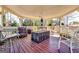 Cozy backyard gazebo with seating area, ceiling fan, and ample space for outdoor enjoyment at 1214 Greenridge Ln, Lithonia, GA 30058
