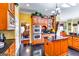 Updated kitchen boasts stainless steel appliances, cherry cabinets, and black countertops at 1214 Greenridge Ln, Lithonia, GA 30058