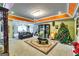 Spacious living area boasting carpet floors, recessed lighting, and elegant decor, creating a warm and inviting atmosphere at 1214 Greenridge Ln, Lithonia, GA 30058
