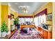 Bright home office with hardwood floors, decorative curtains, and a large desk at 1214 Greenridge Ln, Lithonia, GA 30058