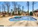 An inviting pool with a built-in spa and a gazebo, set in a well-maintained backyard at 1214 Greenridge Ln, Lithonia, GA 30058