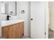 Modern bathroom with a white countertop, wood cabinets and stylish fixtures at 3232 Abbeywood Dr, Decatur, GA 30034