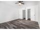Bedroom featuring hardwood floors, ceiling fan and closet with sliding doors at 3232 Abbeywood Dr, Decatur, GA 30034