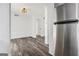 View into dining space with modern lighting and stainless steel fridge at 3232 Abbeywood Dr, Decatur, GA 30034