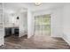 Well-lit kitchen with white cabinets, stainless appliances, leading to dining area at 3232 Abbeywood Dr, Decatur, GA 30034