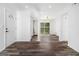 Bright living space with wood-look flooring, natural light, and modern fixtures at 3232 Abbeywood Dr, Decatur, GA 30034