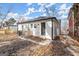 Backyard with a privacy fence and an air conditioning unit at 1030 Westmoor Nw Dr, Atlanta, GA 30314