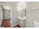 Modern bathroom with updated vanity, mirror, lighting, and fixtures at 1030 Westmoor Nw Dr, Atlanta, GA 30314
