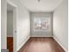This bedroom features hardwood floors and a window to allow for natural light at 1030 Westmoor Nw Dr, Atlanta, GA 30314