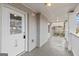 The front porch features a grey concrete floor, white railings, and lights at 1030 Westmoor Nw Dr, Atlanta, GA 30314