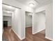 Hallway with hardwood floors and multiple doorways providing access to rooms at 1030 Westmoor Nw Dr, Atlanta, GA 30314
