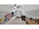Finished attic space with a seating area, foosball table, and dormer window at 17 Sawtooth Oak Dr, Moreland, GA 30259