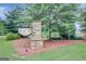 Attractive community entrance sign with stone pillars and landscaping at 17 Sawtooth Oak Dr, Moreland, GA 30259