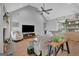 Bright living room boasts vaulted ceilings, fireplace, and stylish furnishings at 17 Sawtooth Oak Dr, Moreland, GA 30259