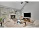 Comfortable living room featuring a stone fireplace and abundant natural light at 17 Sawtooth Oak Dr, Moreland, GA 30259