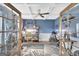 Bright and functional home office with custom shelving and a comfortable workspace at 17 Sawtooth Oak Dr, Moreland, GA 30259