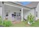 Inviting covered patio with comfortable seating and stylish decor at 17 Sawtooth Oak Dr, Moreland, GA 30259