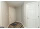 Bright condo entryway featuring hardwood floors and a neutral color scheme at 1017 Ridgefield Dr, Peachtree City, GA 30269