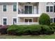 Close up view of a condo featuring a private balcony with outdoor seating at 1017 Ridgefield Dr, Peachtree City, GA 30269
