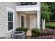 Close up of condo ground floor, showcasing patio and air conditioning unit at 1017 Ridgefield Dr, Peachtree City, GA 30269