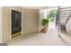 Condo exterior featuring a unit door, bicycle and stairway to the upper units at 1017 Ridgefield Dr, Peachtree City, GA 30269