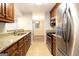 Modern kitchen featuring granite countertops and stainless steel appliances, perfect for cooking at 1017 Ridgefield Dr, Peachtree City, GA 30269