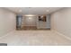 Large open-concept living area featuring carpet and wood flooring at 1017 Ridgefield Dr, Peachtree City, GA 30269
