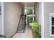 The staircase leads to the upper floors of the complex, providing convenient access to each unit at 1017 Ridgefield Dr, Peachtree City, GA 30269