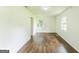 Clean bedroom with well maintained hardwood floors and natural light at 1350 Lori Ct, Conley, GA 30288