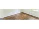 Bright bedroom with beautiful hardwood floors and natural light from the window at 1350 Lori Ct, Conley, GA 30288