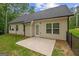 The backyard features a patio with a door and multiple windows offering natural light at 9178 Lakeview Pkwy, Villa Rica, GA 30180