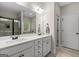Elegant bathroom with double vanity, quartz countertops, and a glass-enclosed shower at 9178 Lakeview Pkwy, Villa Rica, GA 30180