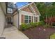 This inviting home boasts well-maintained landscaping and classic shutters, enhancing its curb appeal at 9178 Lakeview Pkwy, Villa Rica, GA 30180