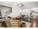 An expansive living room flows seamlessly into the kitchen and sitting room with neutral walls at 9178 Lakeview Pkwy, Villa Rica, GA 30180
