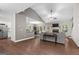 The expansive open-concept living room flows seamlessly into the modern kitchen and dining area at 9178 Lakeview Pkwy, Villa Rica, GA 30180