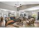 An expansive living room flows seamlessly into the kitchen and dining room with vaulted ceilings at 9178 Lakeview Pkwy, Villa Rica, GA 30180