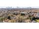 An aerial view of the neighborhood showcasing the lush greenery and distant city skyline at 818 Springdale Ne Rd, Atlanta, GA 30306