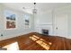Bedroom featuring natural light, hardwood floors, and a decorative fireplace at 818 Springdale Ne Rd, Atlanta, GA 30306