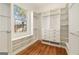 Spacious walk-in closet with custom shelving, drawers, and ample storage space at 818 Springdale Ne Rd, Atlanta, GA 30306