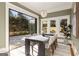 Elegant dining room with abundant natural light, and backyard views at 818 Springdale Ne Rd, Atlanta, GA 30306