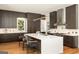 Contemporary kitchen featuring custom cabinets, countertops, and center island at 818 Springdale Ne Rd, Atlanta, GA 30306
