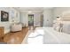 Spacious main bedroom featuring hardwood floors and a peek at an ensuite bathroom at 818 Springdale Ne Rd, Atlanta, GA 30306