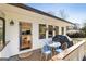 Outdoor patio with grill and dining set, perfect for outdoor entertaining at 818 Springdale Ne Rd, Atlanta, GA 30306