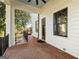 Spacious outdoor patio with brick flooring, providing a perfect spot for relaxation and entertainment at 818 Springdale Ne Rd, Atlanta, GA 30306