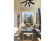 Relaxing outdoor patio furnished with comfortable seating and offering a serene view of the backyard at 818 Springdale Ne Rd, Atlanta, GA 30306