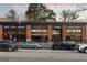 Charming restaurant exterior with brick accents, stylish signage, and inviting windows providing a glimpse inside at 818 Springdale Ne Rd, Atlanta, GA 30306