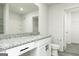 Clean bathroom showcasing granite countertop, white cabinets, and modern fixtures at 455 Prescott Way, Villa Rica, GA 30180